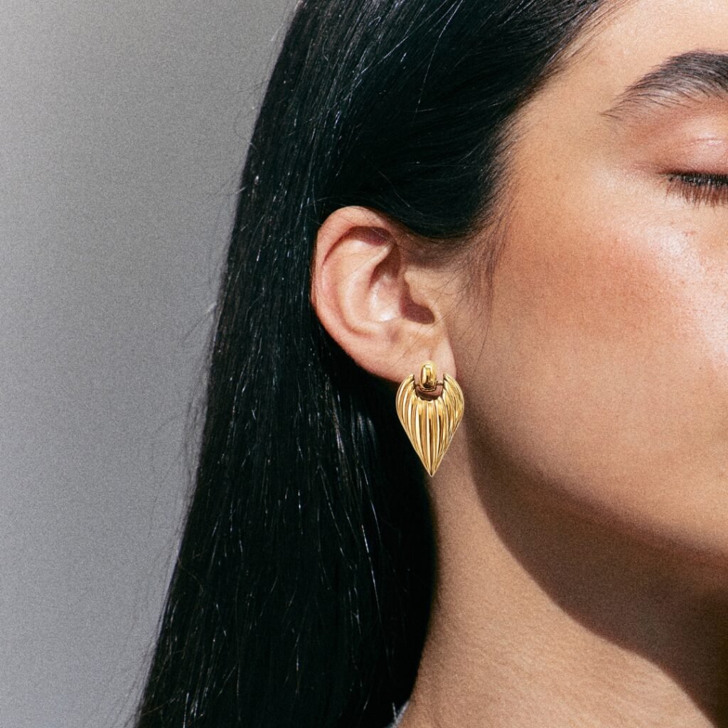 A woman wearing Her On Jewellery Earring 